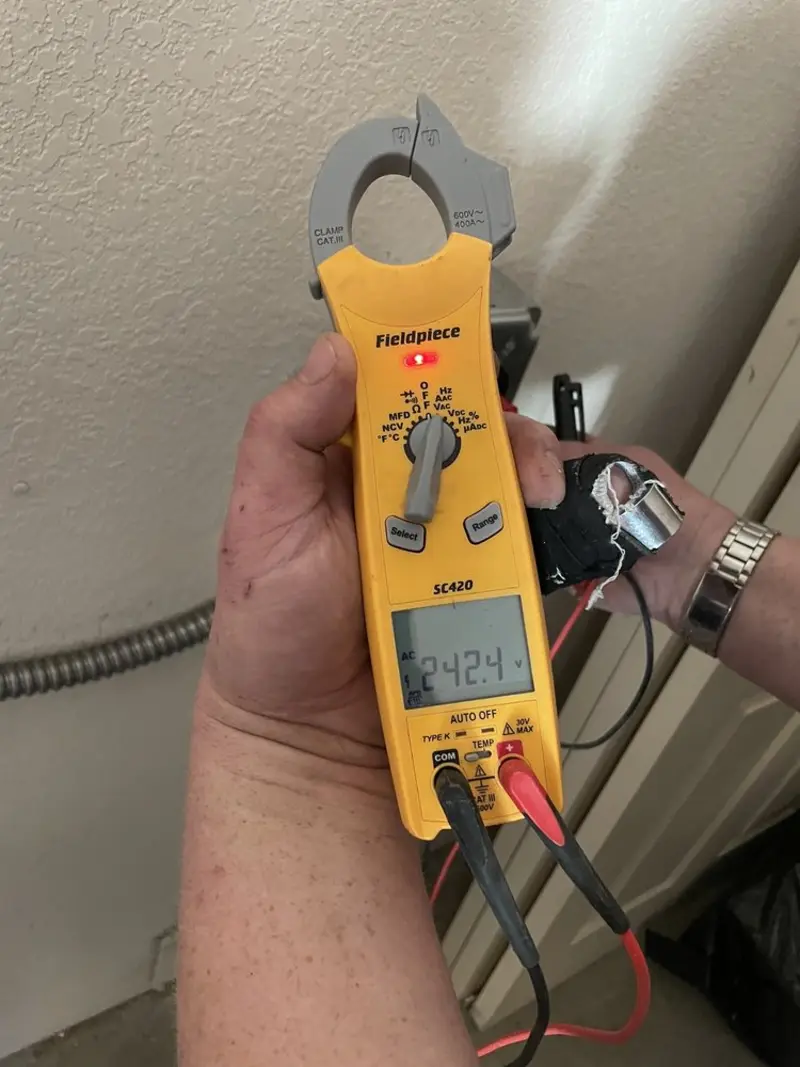 Voltage testing with clamp meter during Aluminum Wiring Replacement in DeWitt